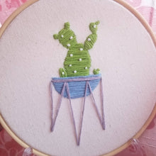 Load image into Gallery viewer, Hand embroidered succulent art hoop with bunny ear cactus in purple or green as a gift