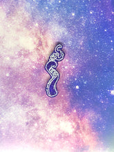 Load image into Gallery viewer, sparkly purple curled tentancle earring with white outlines against a pink-and-blue nebula and black crushed velvet background