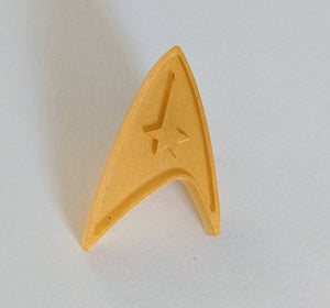Star Trek gold resin combadge pin