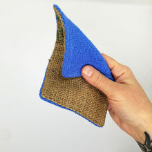 Load image into Gallery viewer, a hand holds up an upcycled dish scrubber, showing both the burlap and terry cloth sides

