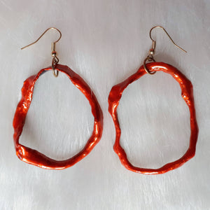 Avocado skin earrings painted orange/purple