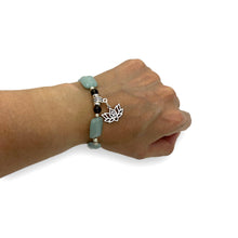 Load image into Gallery viewer, Aqua Glass Beads and Smokey Quartz with Silver Om Charm Mala Bracelet
