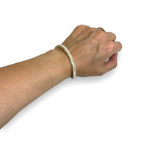 Load image into Gallery viewer, Gold and White Plastic Lacing Bracelet
