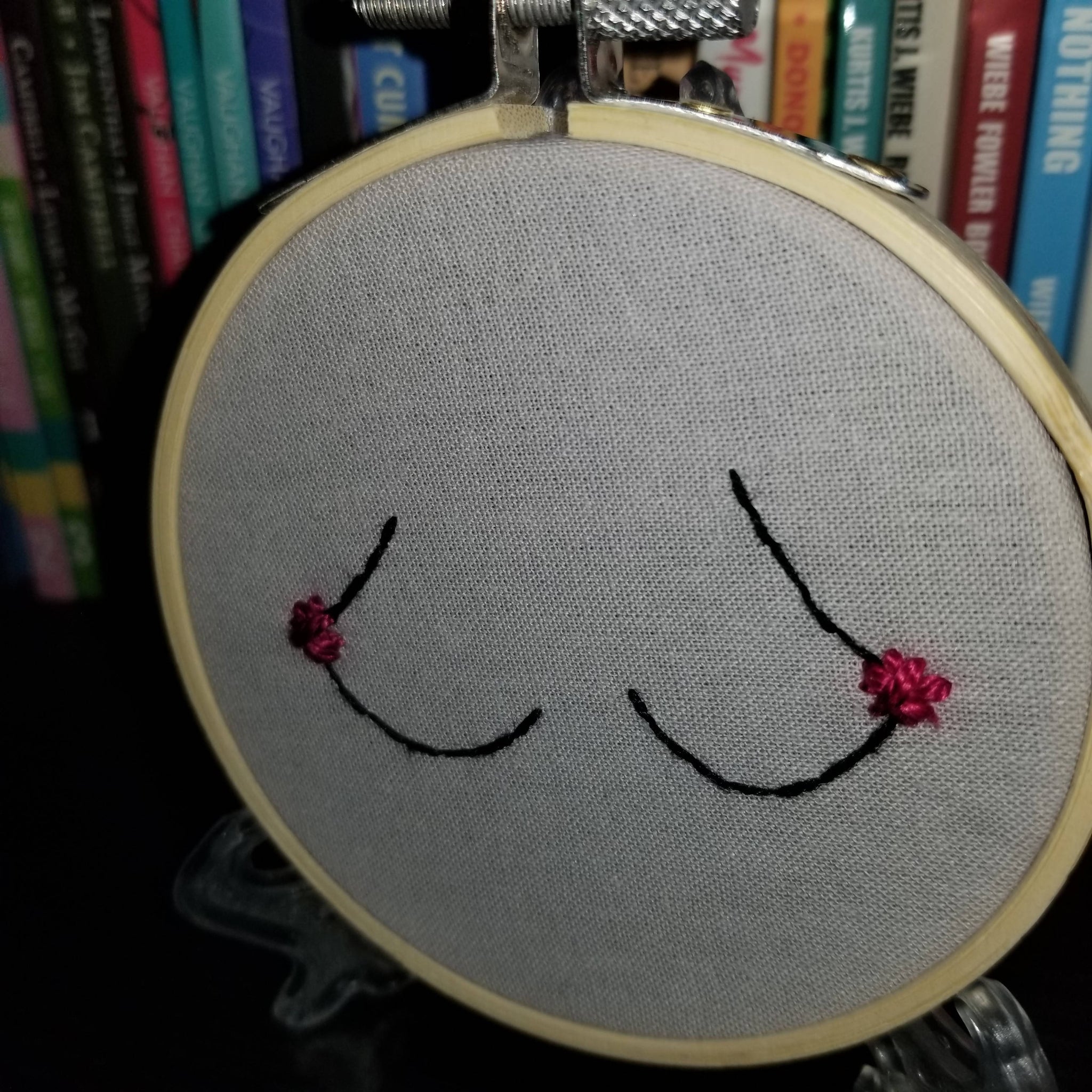 Hand embroidered pink flowers and pointy boobs art hoop – Flamingo