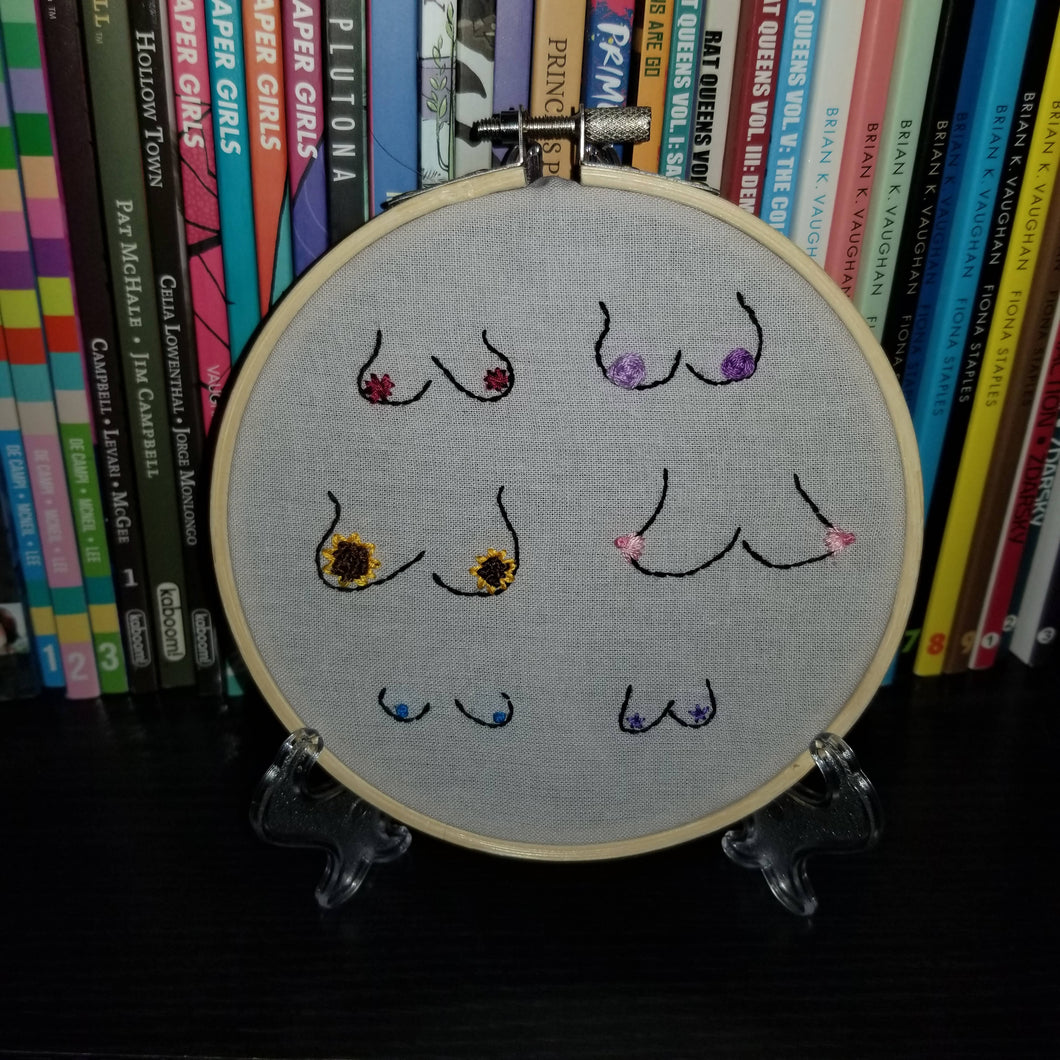 Hand embroidered flowers and boobs art hoop