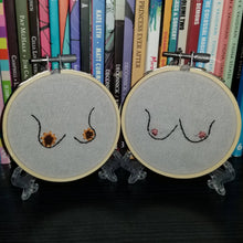 Load image into Gallery viewer, Hand embroidered sunflowers and boobs art hoop
