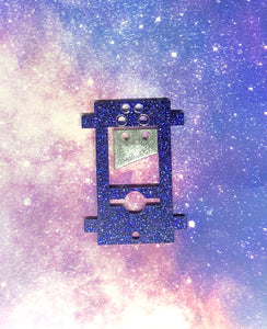 sparkly purple guillotine earring with a silver blade against a pink-and-blue nebula