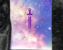 Load image into Gallery viewer, purple long sword earring with bright white outlines against a pink-and-blue nebula and black crushed velvet background
