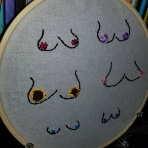 Hand embroidered flowers and boobs art hoop